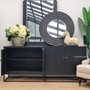 Canalside Interiors presents the St Lucia Sideboard, where the distressed black finish and iron base offer a bold contrast to a bright living space