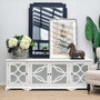 The mirror positioned above a console table in an entryway, showcasing its versatility and elegance.