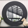 Detail shot of the distressed black/charcoal finish, showcasing the mirror's casual yet classic appeal, perfectly on-trend with contemporary tastes.