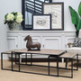 View of the tables partially nested, offering a versatile setup option for dynamic living room layouts.