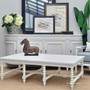 The Bobbin coffee table adorned with chic decorative items, demonstrating its functionality as both a statement piece and a practical surface.