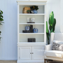 Frontal view of the Grange 2 Door Bookshelf Wall Unit in white with minor distressing, showcasing its spacious shelves - perfect for a Hamptons-style living room