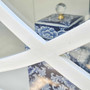 Shot of the Riviera Display Cabinet's open shelving, perfect for storage and display in a refined living room