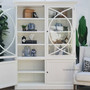The Riviera's open doors revealing shelving space, ideal for a display of books and treasures in a personal library