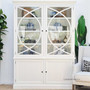 View of the Riviera Display Cabinet with decor items, combining elegant formality with practical storage in a stylish lounge room
