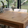 Side view capturing the contemporary silhouette of the Hayworth Dining Table, ideal for a Hamptons-inspired interior.