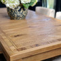 Detail of the hand-crafted finish on the Hayworth Dining Table, showcasing the beauty of weathered reclaimed oak.