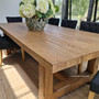 View of the Treadstone Oak Table, showcasing its durability and style in a contemporary setting.