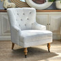Detail of the Ascott Armchair's castor wheels, merging practicality with the chair's timeless coastal appeal.