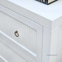 Detail-focused view of the chest's fluted timber, an ode to classic craftsmanship for a modern interior.
