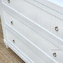 Close frontal shot of the Sorrento 6 Drawer Chest's ribbed feature, showcasing the chic combination of textures