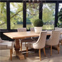 The Artisan Dining Table's silhouette in a minimalist dining room, highlighting the piece's modern rustic vibe