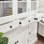 The white Key Largo Unit, with its elegant fluting and storage prowess, stands as a centrepiece in a home office