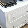 Side angle of the white Sorrento 2 Drawer Bedside showcasing its classical design | Coastal Chic