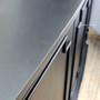 Top surface detail of the black Leontine Sideboard, illustrating the perfect blend of modern design and timeless quality