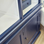 Side shot of the Grange 3 Door Wall Unit, highlighting the contrast of navy and white | Timeless Appeal