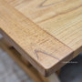 Close-up of the Harvest table's handcrafted white cedar, highlighting the smooth finish and natural texture.