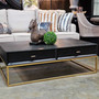 Front angled view of the St Lucia Coffee Table in black with gold gilded base