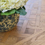 Detail shot showcasing the precision of the parquetry work, a hallmark of skilled UK craftsmanship.