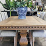 Front View emphasising the Berenson table's carved details, blending traditional craftsmanship with modern design elements.