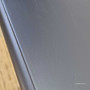 Top-down view of the Louis Curved Buffet emphasising the smooth and paint-stroke black surface.