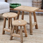 Close-up of the Vintage Teak Rectangular Stool with natural light, highlighting its rich wood grain and aged texture.
