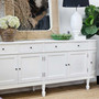 Side angle of the Louis Curved 250cm Sideboard, highlighting its sculptural silhouette and smooth paint-stroke finish.