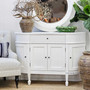 Angled front view of the Louis Curved 130cm Sideboard, highlighting the smooth white finish and classic silhouette.