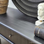 Close-up of the Louis Curved Sideboard’s ribbed fluting, showcasing the intricate textural detail.