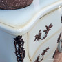 Top-down shot of the chest, revealing the soft fading around the edges and curved top surface.