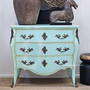 Shot with modern and antique pieces nearby, demonstrating versatility in layered interiors.