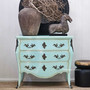 Front view of the piece, emphasising the French bombe silhouette and playful colour.