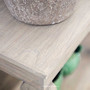 Close-up of the shelf joinery, revealing artisan construction and timber finish.