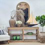 Bramwell Console styled against a white panelled wall, adding warmth and architectural structure.
