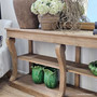 Natural light hitting the timber surface, enhancing the wood’s tone and texture.