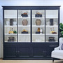 Front-facing image of the Grange 4 Bay Wall Unit in satin black with crisp white interior shelving.