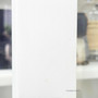 Macro detail of the painted timber grain in the white finish under natural lighting showing the paint stroke patina