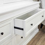 Close-up of drawer reveal showing smooth glide with metal drawer runner and internal cavity.