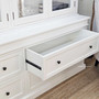 Drawers partially open to reveal internal space for practical storage.