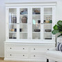 Angled view from the right highlighting the smooth painted finish and classic shaker drawer fronts.