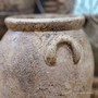 Close-up of one of the Sekar pot’s handles, revealing its handmade detailing and textured surface.