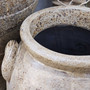 Detailed top-down image of the Sekar pot, drawing out tonal warmth in the clay and highlighting its handcrafted character.