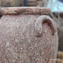 Close-up of one of the Sekar pot’s handles, revealing its handmade detailing and textured surface.