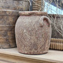 Natural light image of the Sekar pot, drawing out tonal warmth in the clay and highlighting its handcrafted character.