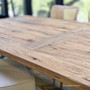 Image of the table with light shadows to highlight depth and natural patina.