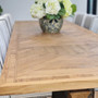 Stunning parquetry pattern on the Danbury Oak Dining Table, merging coastal and Hamptons styles for modern homes