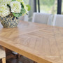 Danbury's grand oak dining table, a statement of heritage and quality in any spacious living room - Canalside Interiors.
