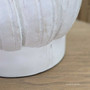 Detail of solid timber grain on Fern Bay lamp base in distressed white