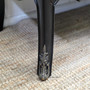 Side angle focusing on the flared leg design, with visible distressing along the base and aged brass hardware