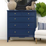 Elegant Navy Blue Peninsula 5 drawer chest styled in a modern living space with decorative accents.